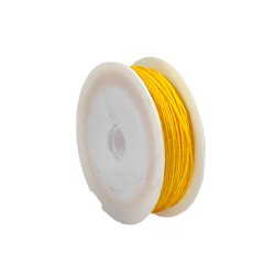 Spool of waxed whipping twine made of twisted polyamide, ideal for seizing, whipping, and lashing. The twine is treated with wax